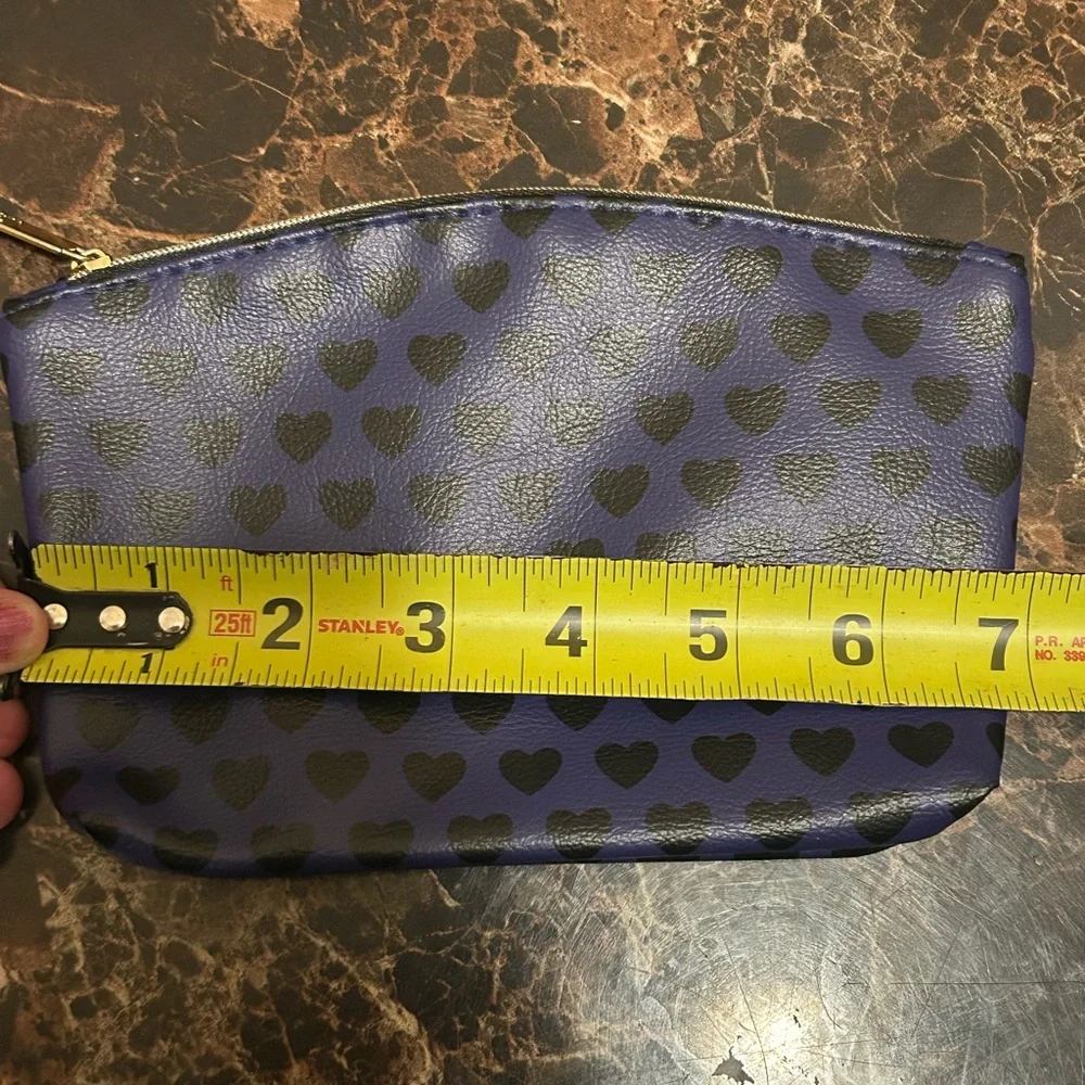 Ipsy indigo make up bag with black heart print